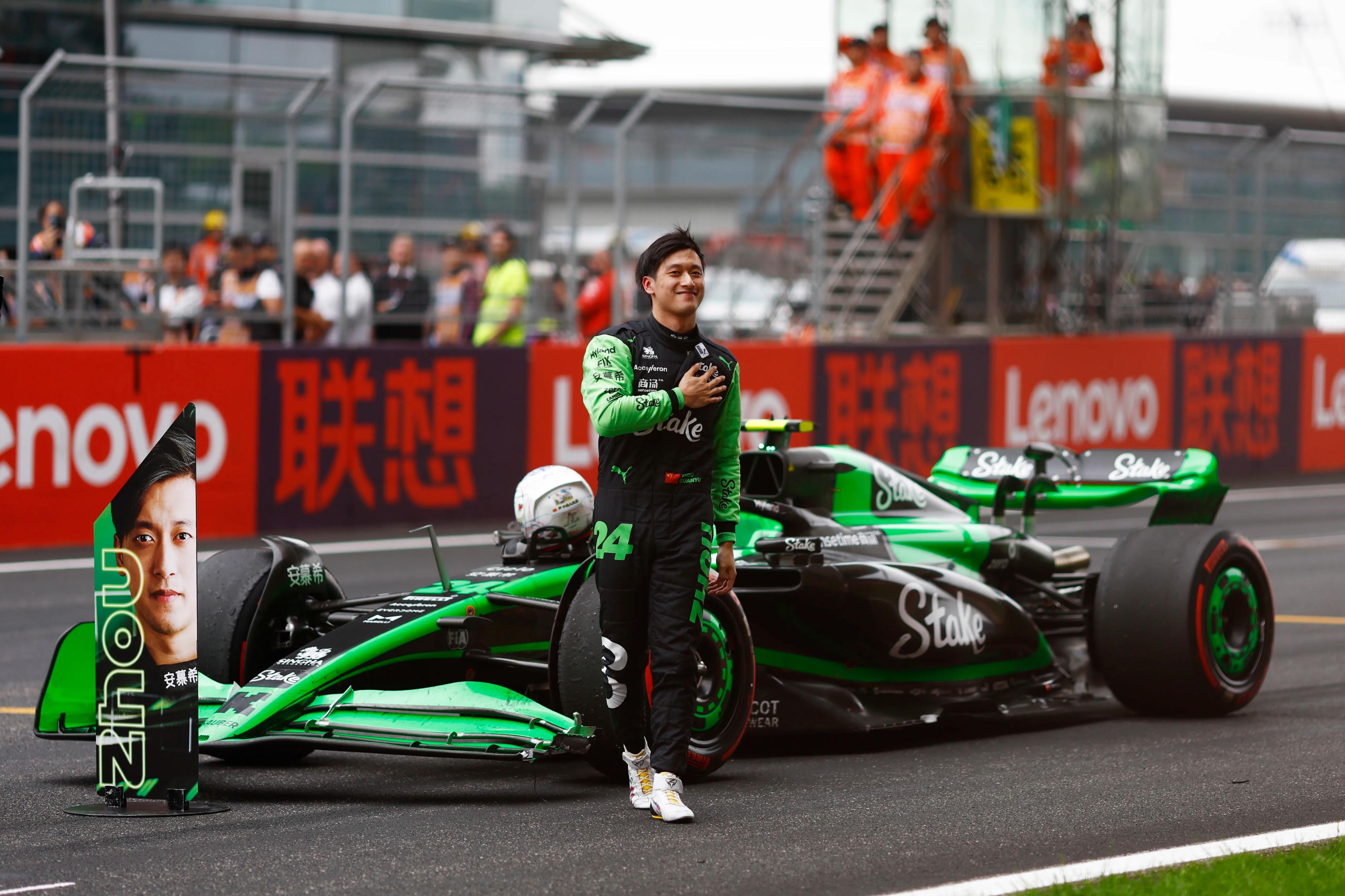 Zhou Guanyu and Stake F1 Car - 4K Background Zhou Guanyu and Stake F1 Car - Sports Photography 4K Wallpaper (4000x2666)